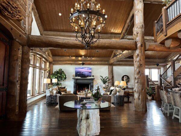 A large room with lots of furniture and a chandelier.